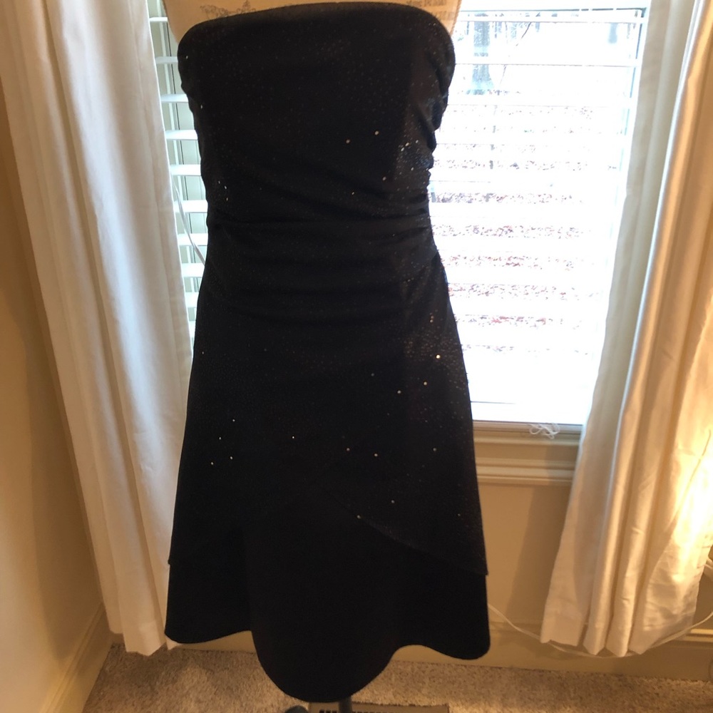Retro inspired sparkling black tea length dress!